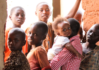 Group of children looking out a window